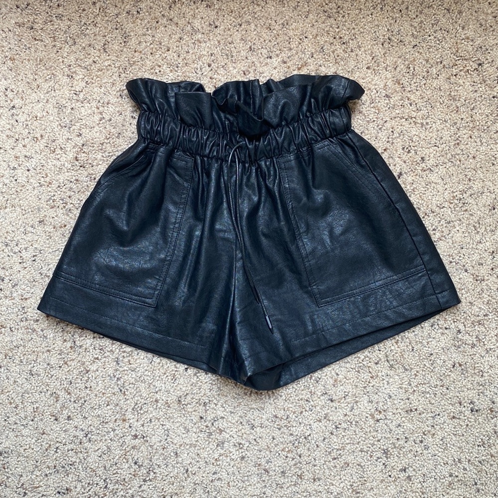 Black faux leather shorts